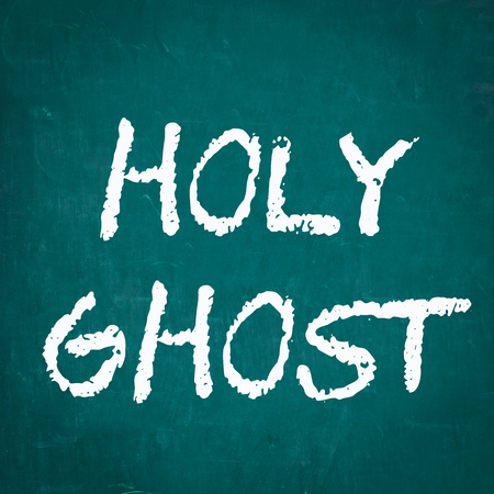 HOLY GHOST written on chalkboardの写真素材