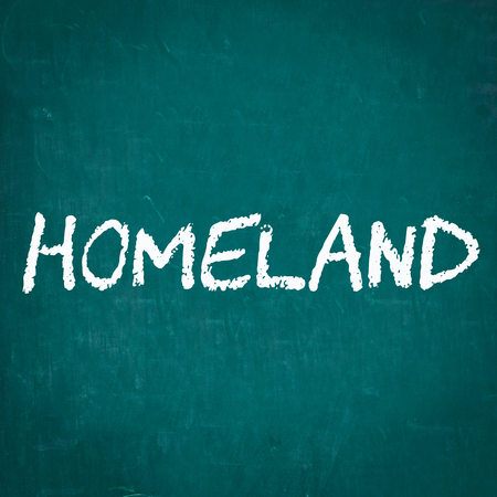 HOMELAND written on chalkboardの写真素材