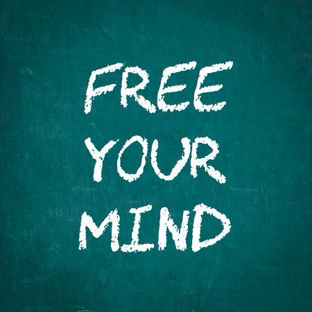 FREE YOUR MIND written on chalkboardの写真素材