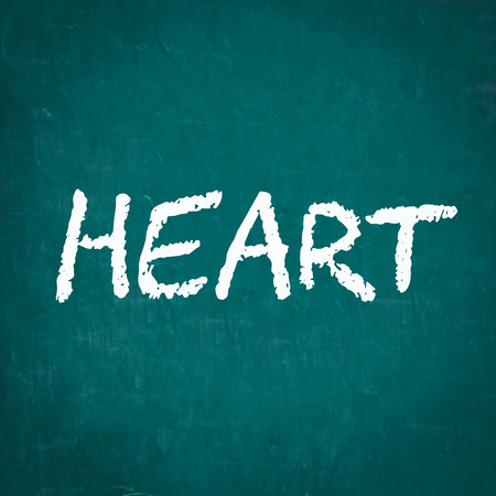 HEART written on chalkboardの写真素材