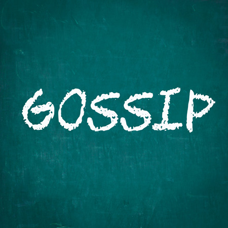 GOSSIP written on chalkboardの写真素材