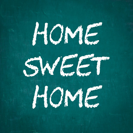 HOME SWEET HOME written on chalkboardの写真素材