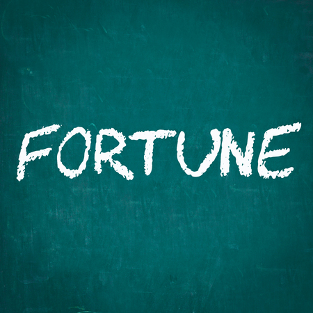 FORTUNE written on chalkboardの写真素材