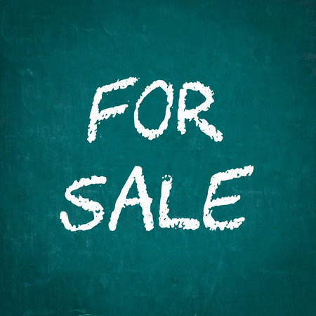 FOR SALE written on chalkboardの写真素材