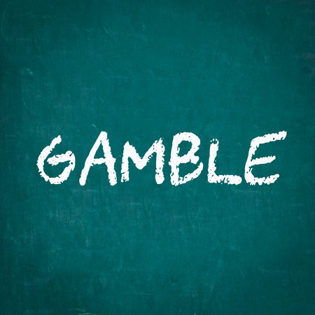 GAMBLE written on chalkboardの写真素材