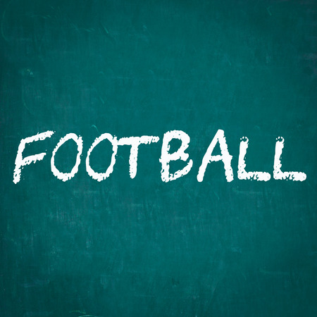 FOOTBALL written on chalkboardの写真素材