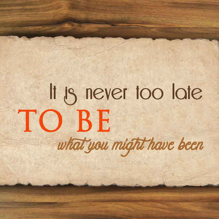 Inspirational quote on  grunge paper against wood backgroundの写真素材