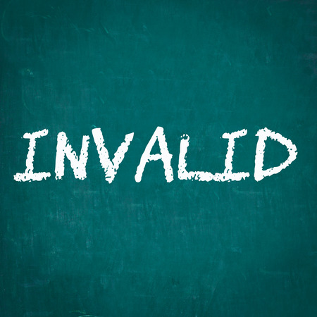 INVALID written on chalkboardの写真素材