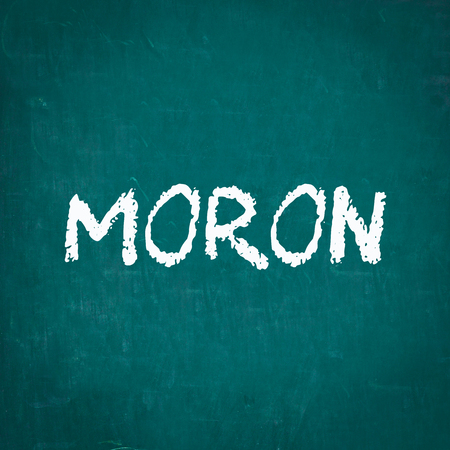 MORON written on chalkboardの写真素材