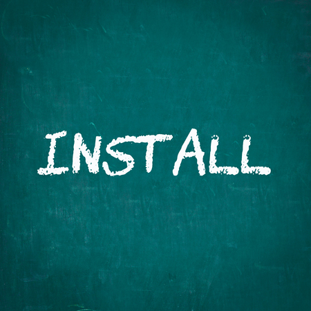 INSTALL written on chalkboardの写真素材