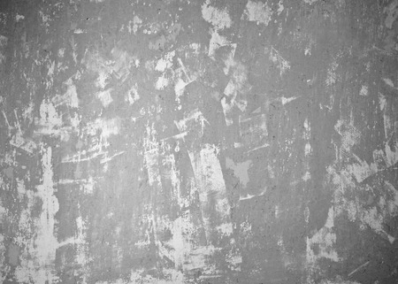 Old gray damaged wall backgroundの写真素材