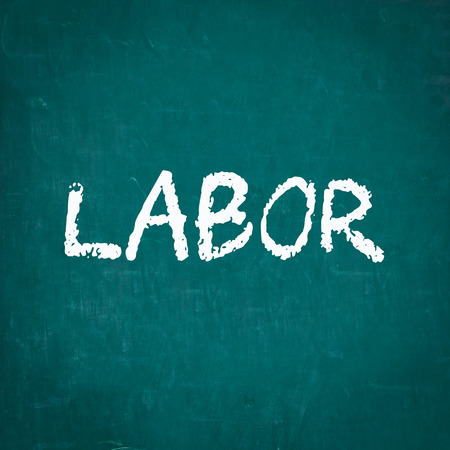 LABOR written on chalkboardの写真素材