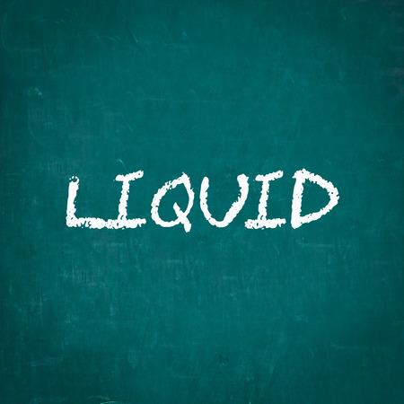 LIQUID written on chalkboardの写真素材