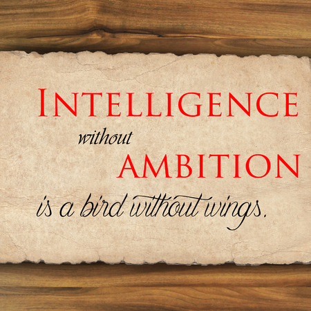 Inspirational quote on  grunge paper against wood backgroundの写真素材