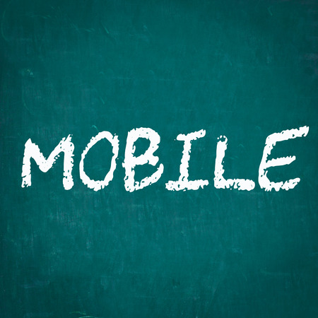 MOBILE written on chalkboardの写真素材