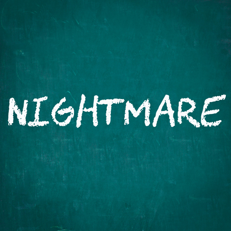 NIGHTMARE written on chalkboardの写真素材