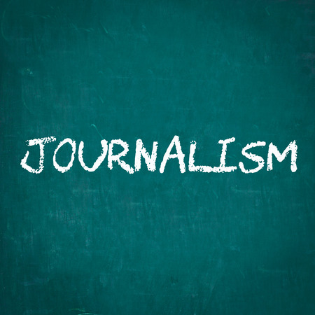 JOURNALISM written on chalkboardの写真素材