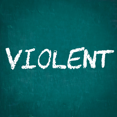 VIOLENT written on chalkboardの写真素材