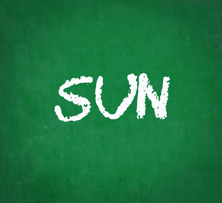 SUN written on chalkboardの写真素材