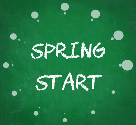 SPRING START written on chalkboardの写真素材