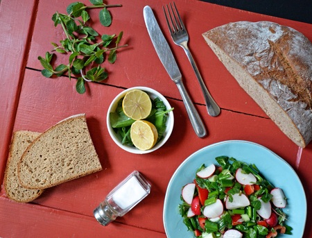 Fresh salad with breadの写真素材