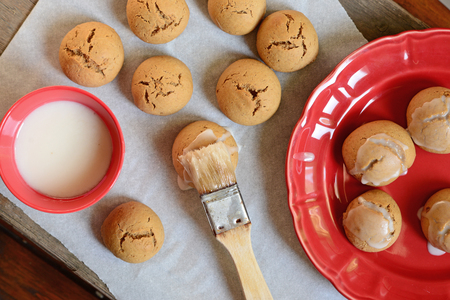 Gingerbread ball cookies on wooden tableの写真素材