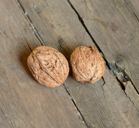 Walnut on wooden backgroundの写真素材