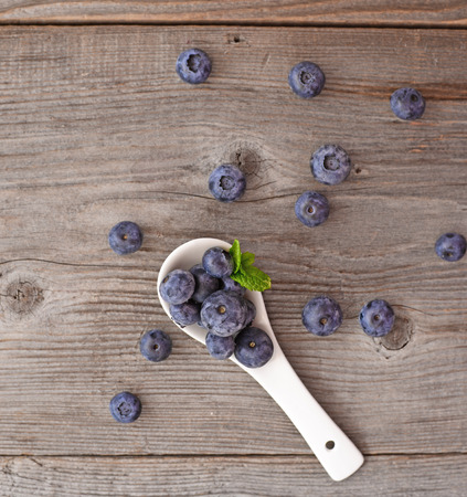 Fresh blueberry on wooden backgroundの写真素材