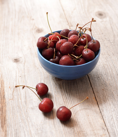 Fresh cherry on wooden tableの写真素材