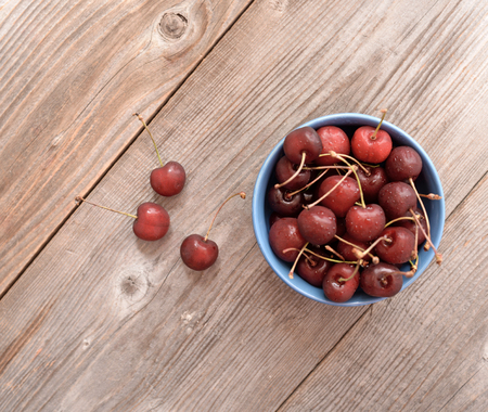 Fresh cherry on wooden tableの写真素材
