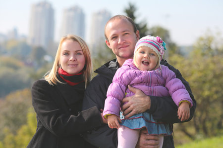 Happy family having fun outdoors
