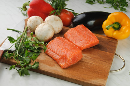 Fresh salmon with vegetables and mushroomsの写真素材