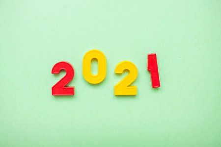Happy New year 2021 celebration. The inscription 2021 on the green backgroundの写真素材