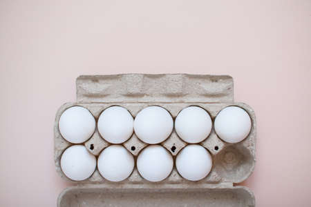Recyclable cassette with white eggs on light background. High quality photoの写真素材