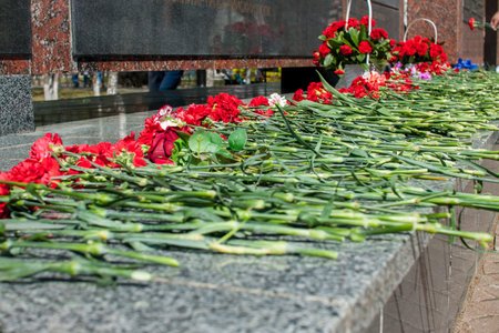 Izhevsk - Russia - 05.09.2021: Victory Day, laying flowers at the Eternal Flame. High quality photo