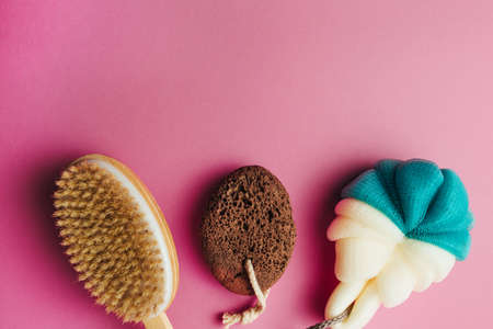 washcloth, bathing brush and heel foam. concept of accessories for shower, bath and spa salonの写真素材