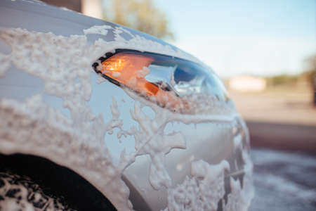 headlight soapy foam .Self-service car wash conceptの写真素材