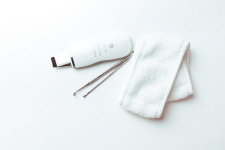 uno's scrubber spoon on a white background top view .the concept of cosmetology and spa .space for...