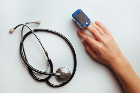 diagnostics of and pneumonia device heart rate monitor measures lung saturation and stethoscopeの写真素材