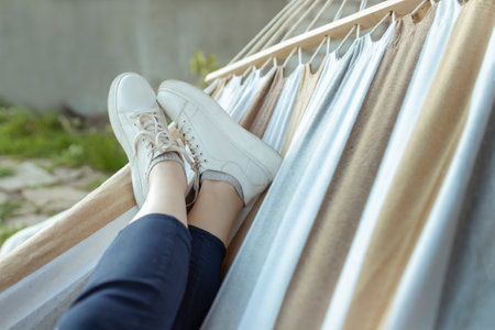 relaxing in the hammock in the summer gardenの写真素材