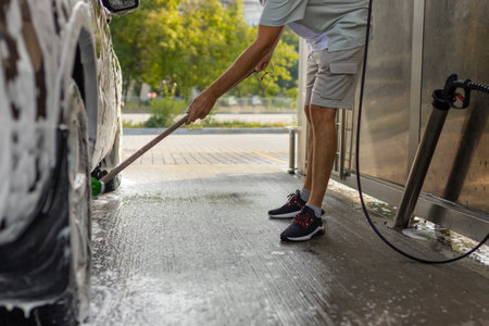 He loves his car. Man washing car.の写真素材