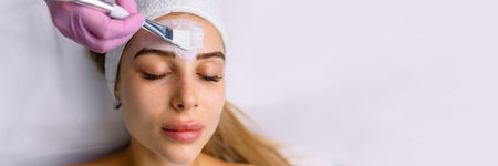 facial rejuvenation treatment with cream at the spaの写真素材