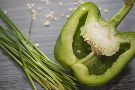 Close up shoot of the green pepper cuted by the halfの写真素材