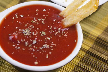 Dip - a  tomato and garlic sauce with herbs used with a french fries
