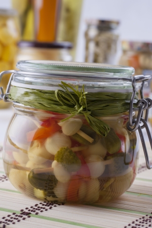 Pickle Jar - winter ideas - taste of summer on your table: mushrooms, olives and red pepper in a olive oil.の写真素材