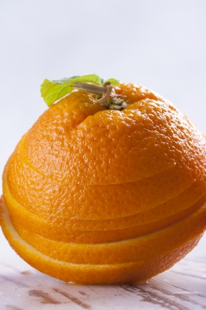 Composition of vegetarian healthy food - sliced fruits on a wooden background.の写真素材