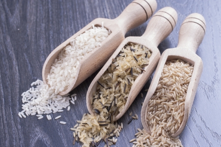 Close up photo of food ingredients - staple food - wooden spatula with a rice.の写真素材