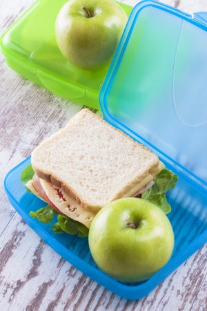 Breakfast for a school children - ready to eat - sandwich with a green appleの写真素材