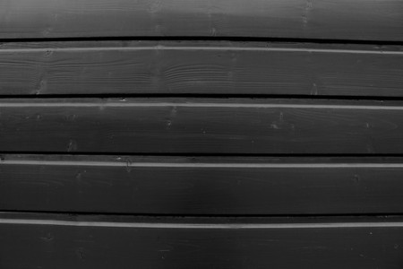 Horizontal wood black backgroundの写真素材