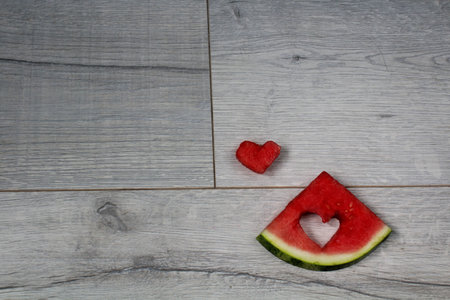 Watermelon on the wood backgrounの写真素材